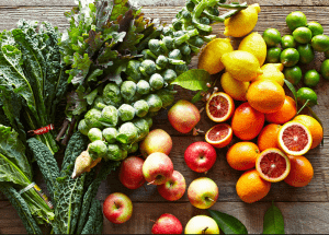 a group of fruits and vegetables on a wood surface Healthy Weight Loss Diets York